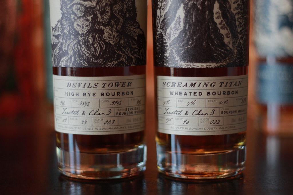 devils tower high rye bourbon next to screaming titan wheated bourbon
